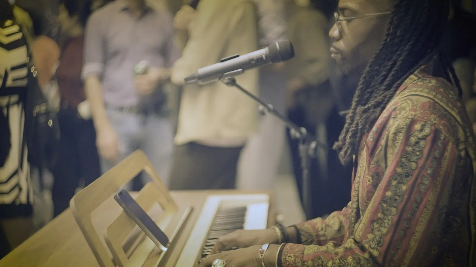 Aaron Marcellus singing at the Alpange